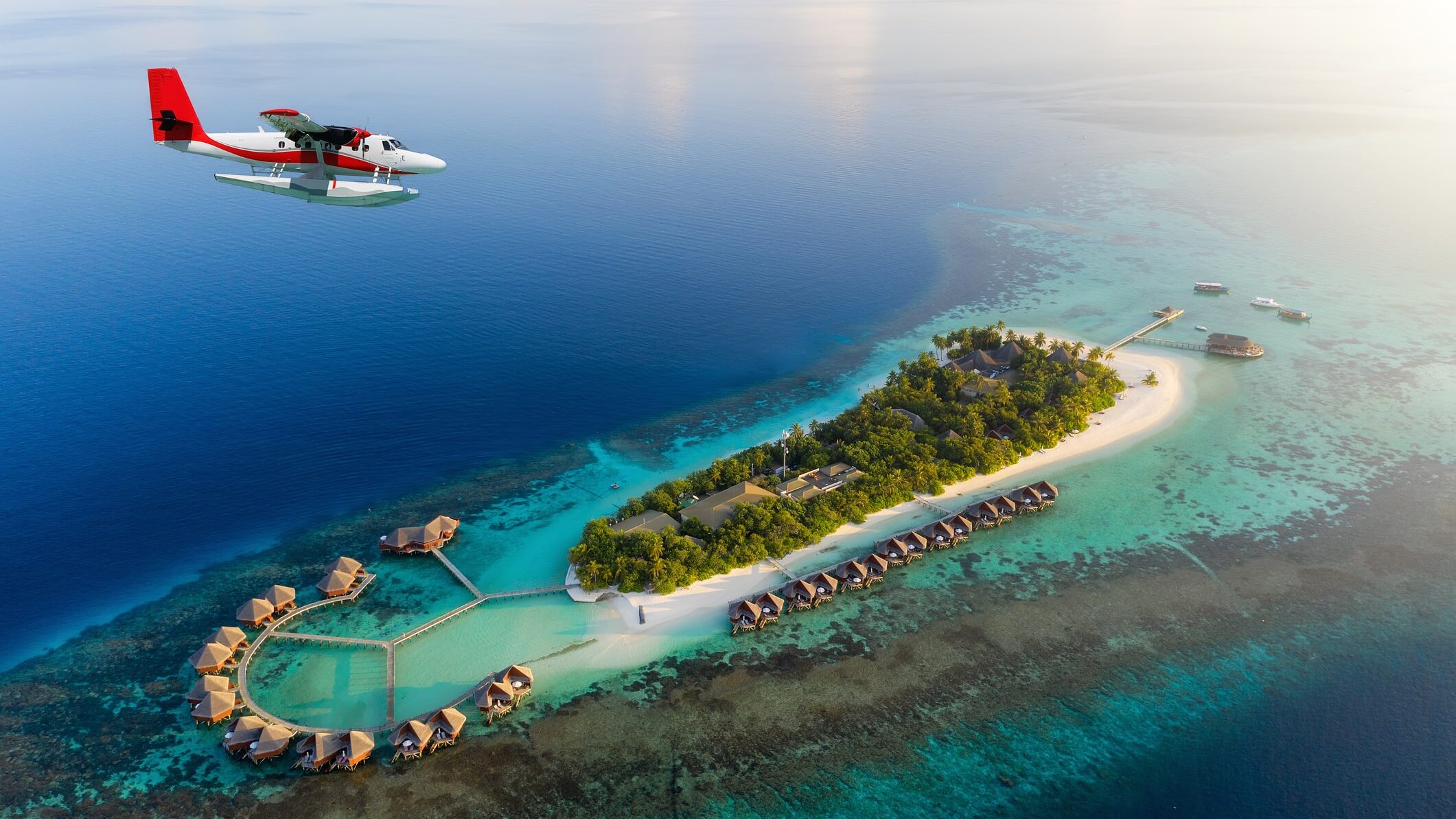 Seaplane flying over the maldives island