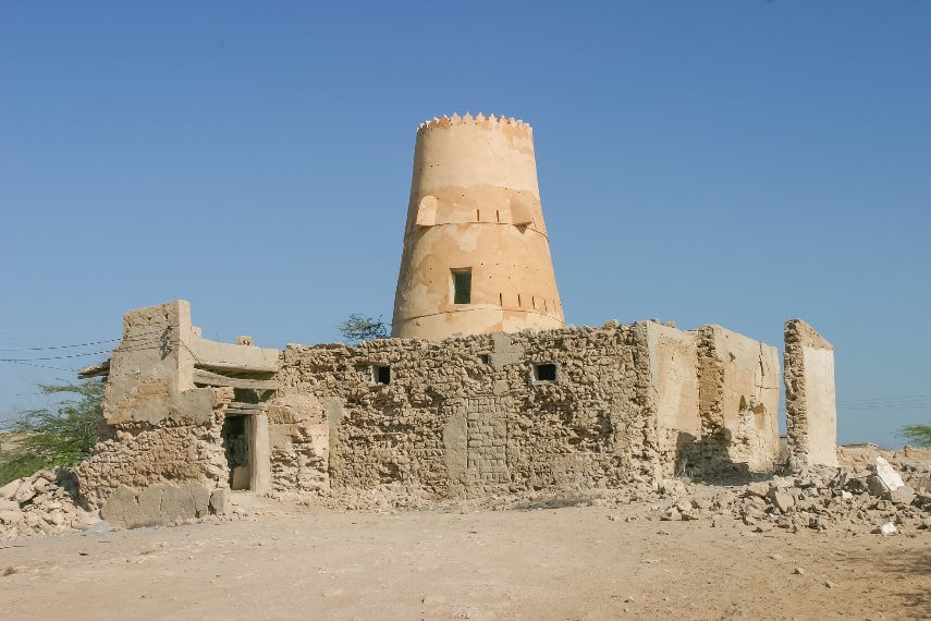 Walk through the ruins of the Al Jazirat Al Hamra ghost town