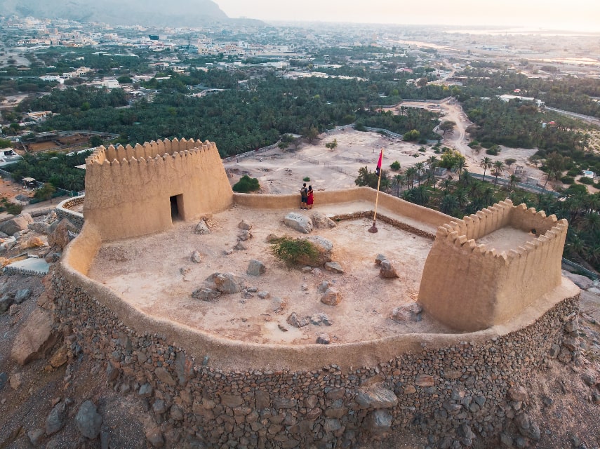 Climb the winding steps to the top of Dhayah Fort