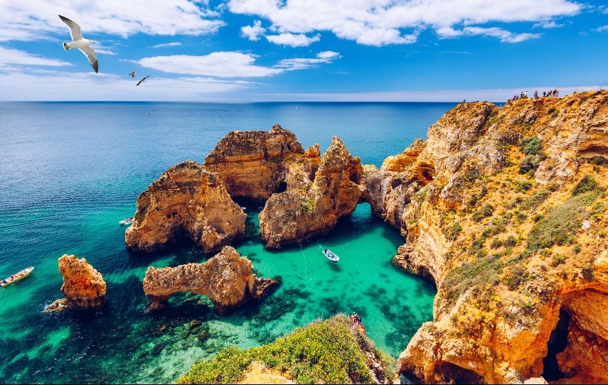 Algarve, Portugal, is a warm destination to visit in March for a short-haul trip